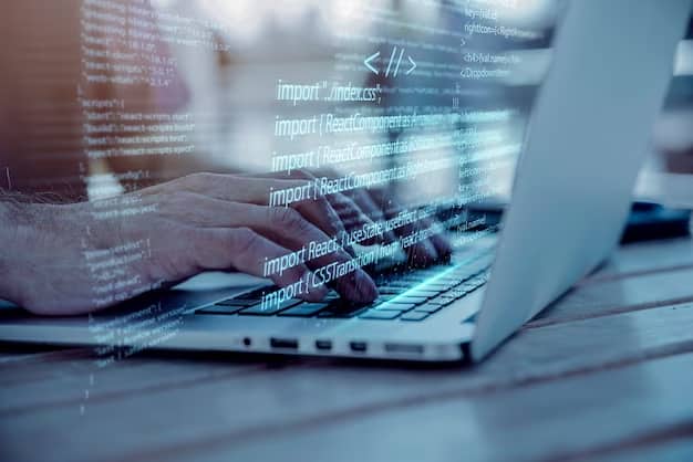 A man does programming on a laptop