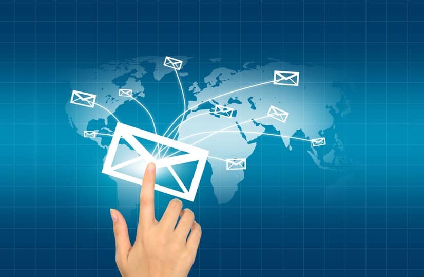 Hand Pressing an Envelope Which Sends to the World